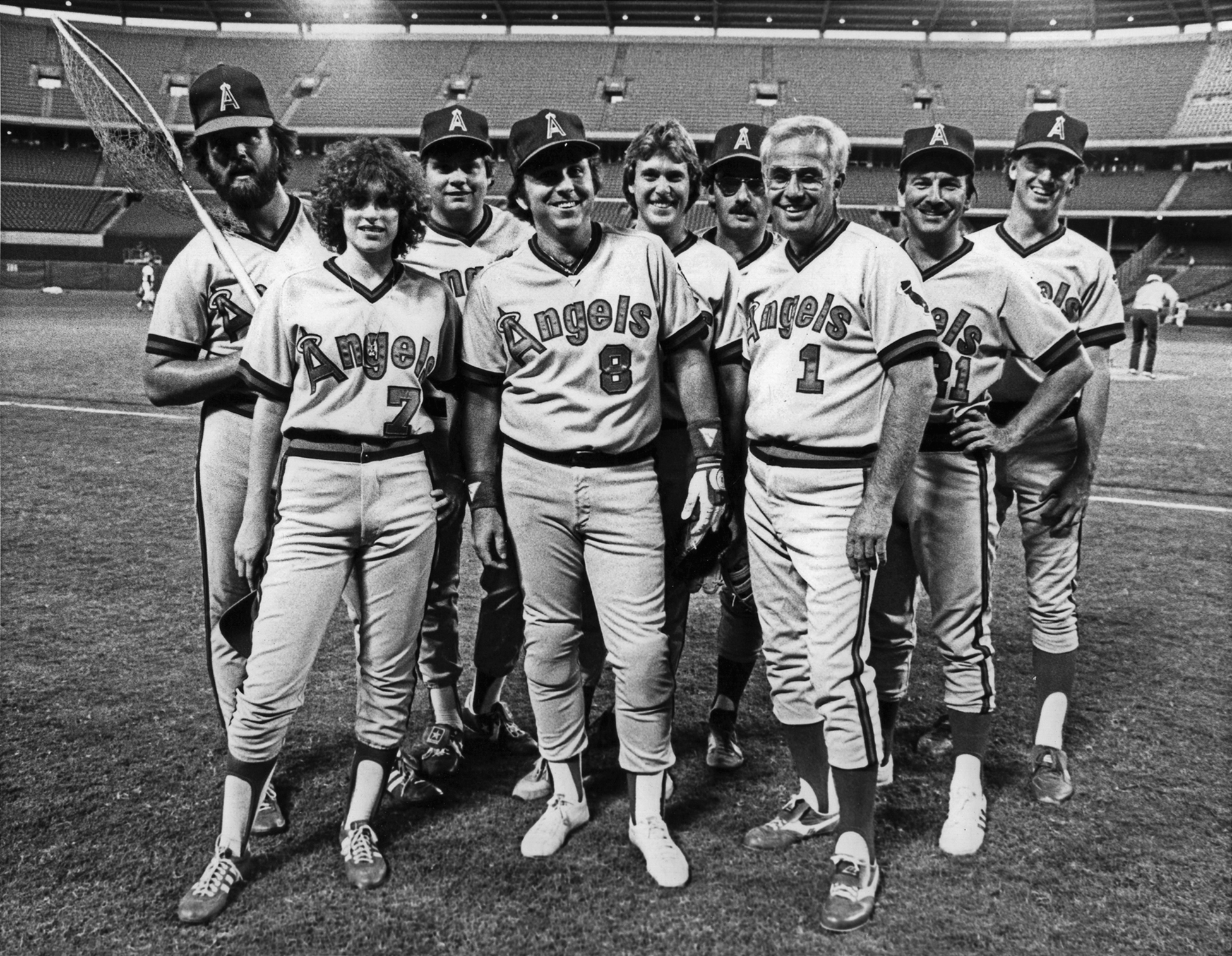Lisa Saxon and the press corps covering the (then) California Angels suit up in 1983 for an exhibition game vs. the Happy Days cast. Lisa hit a single off The Fonz. Photo: V.J. Lovero