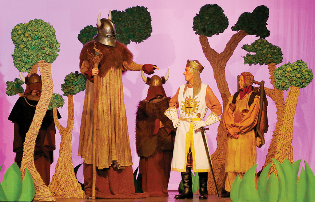 King Arthur (Max Vaupen, center) and Patsy (Charlie Hobert, right) meet the Knight of Ni (Ethan Egilsson, left) in the upcoming ￼Palisades High production of Monty Python’s Spamalot. Photo: Felix Massey